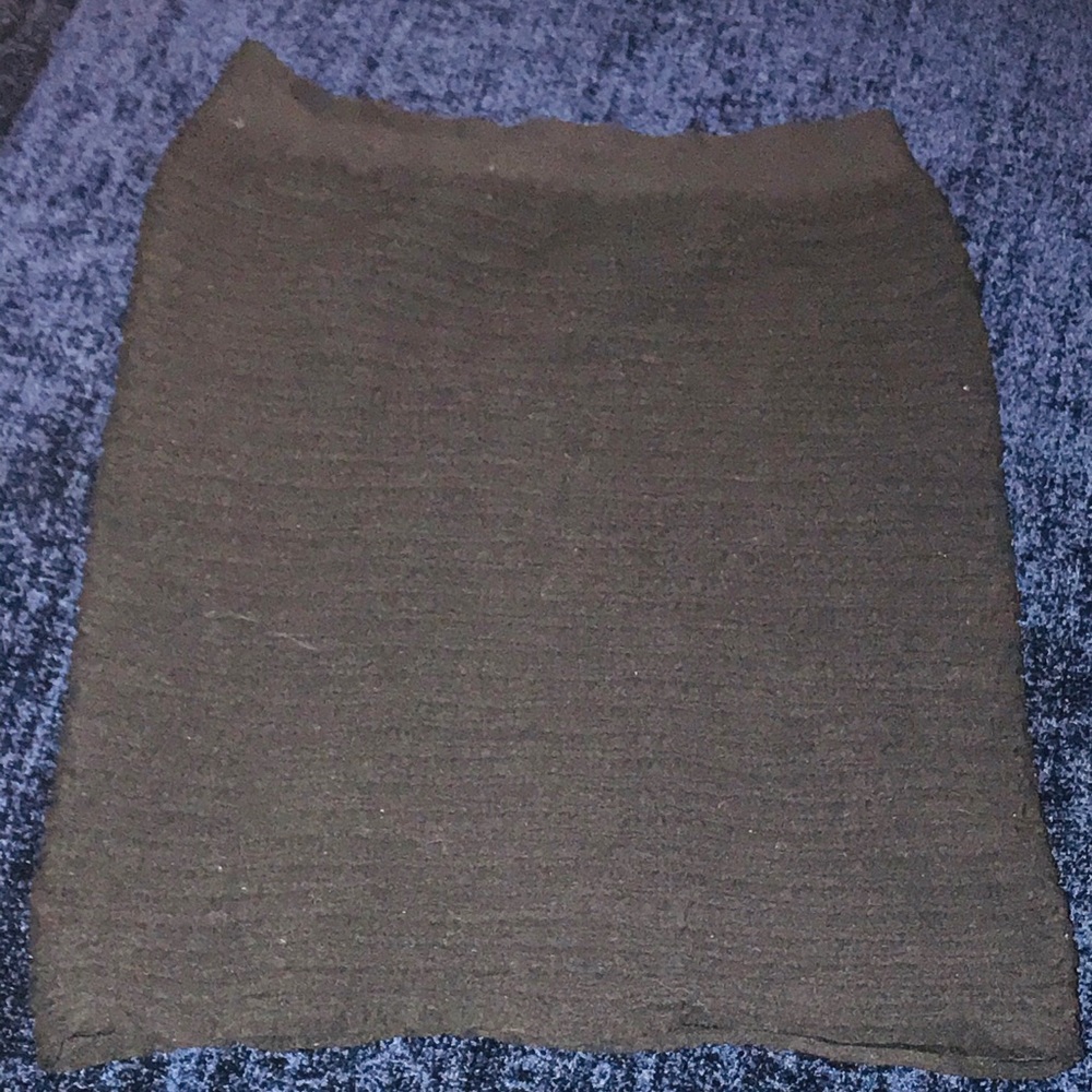 Stretchy black mini skirt.